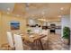 Bright dining area with wood table and kitchen views at 1433 Pueblo Dr, Boulder City, NV 89005