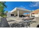 Stunning home exterior with a porte cochere and water feature at 1433 Pueblo Dr, Boulder City, NV 89005