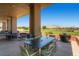 Relaxing outdoor patio overlooking a golf course at 1704 Pinion Mesa Ct, Las Vegas, NV 89128