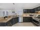 Modern kitchen featuring stainless steel appliances and granite countertops at 1712 Shadow Bay Ct, North Las Vegas, NV 89032