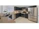 Modern kitchen with stainless steel appliances and granite countertops at 1712 Shadow Bay Ct, North Las Vegas, NV 89032