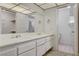 Bright bathroom with double sinks, and a separate shower and tub at 1804 Piccolo Way, Las Vegas, NV 89146