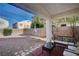 Covered patio with seating area and view of backyard at 3554 Cherbourg Ave, Las Vegas, NV 89141