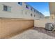 Private backyard patio with block wall and fence at 3744 Brilliant Sunset St, Las Vegas, NV 89129