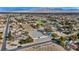 Aerial view of a house with a large backyard and mountain views at 4571 N Chieftain St, Las Vegas, NV 89129