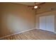 Spacious bedroom with laminate wood flooring and ceiling fan at 5236 Ladyhawk Way, Las Vegas, NV 89118