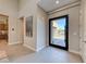 Bright and spacious entryway with view into living room at 6695 Regency Stone Way, Las Vegas, NV 89148