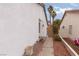 Side yard with brick pathway and landscaping at 6724 Reggie Cir, Las Vegas, NV 89107