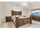 Large bedroom with dark wood furniture and carpeted flooring at 8017 Flambeau St, Las Vegas, NV 89131