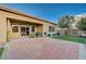 Backyard patio with seating area and view of house at 8233 San Mateo St, North Las Vegas, NV 89085