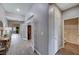 Bright entryway with tile flooring, and a view of a bathroom at 8233 San Mateo St, North Las Vegas, NV 89085