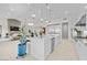 Spacious kitchen featuring white cabinets and stainless steel appliances at 10010 Savannah Marie Ave, Las Vegas, NV 89149