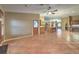 Open concept living room with tile flooring and kitchen views at 1052 Hollyhock Dr, Henderson, NV 89011