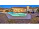 Inviting pool and spa with a covered patio at 1052 Hollyhock Dr, Henderson, NV 89011