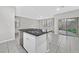 Kitchen island with granite countertop and double sink at 10574 Siesta Key St, Las Vegas, NV 89141