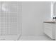 Modern bathroom with white grid tile shower and floating vanity at 1225 S 15Th St, Las Vegas, NV 89104