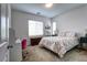 Charming bedroom with floral bedding and a built-in desk at 20 Barbara Ln # 20, Las Vegas, NV 89183