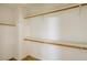 Spacious walk-in closet with double hanging rods and shelves at 2100 Desert Peak Rd, Las Vegas, NV 89134