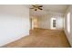 Large main bedroom with carpeted floors and ceiling fan at 2100 Desert Peak Rd, Las Vegas, NV 89134