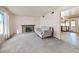 Living room with fireplace and view into kitchen at 4342 Sunnyview Ct, Las Vegas, NV 89147