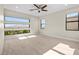 Well-lit bedroom with large windows offering scenic views at 64 Grey Feather Dr, Las Vegas, NV 89135