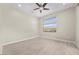 Spacious bedroom with wood-look floors and ceiling fan at 64 Grey Feather Dr, Las Vegas, NV 89135