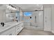 Modern bathroom with double vanity, large shower, and elegant tile at 6816 Rio Sands Ct, Las Vegas, NV 89130