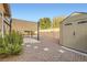 Backyard patio with pergola, storage shed, and gravel landscaping at 7232 Tealwood St, Las Vegas, NV 89131