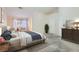 Main bedroom with plush carpet, large closet, and plenty of space at 7232 Tealwood St, Las Vegas, NV 89131