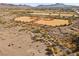 Aerial view showing community baseball fields and a desert landscape at 852 Bussora Rose Dr, Henderson, NV 89015