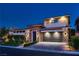 Stunning modern home with stone accents and a three-car garage at 10 Moonfire Dr, Las Vegas, NV 89135