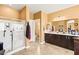 Elegant bathroom with double sinks, a large shower, and a toilet at 173 Kirkton St, Henderson, NV 89012