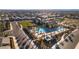 Aerial view of community pool, clubhouse, and surrounding homes at 2380 Cold Canyon Ave, North Las Vegas, NV 89086