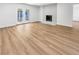 Bright and airy living room with hardwood floors and a fireplace at 281 E Chaparral Dr, Henderson, NV 89015