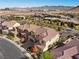 Aerial view of a house in a residential community at 3377 Royal Fortune Dr, Las Vegas, NV 89141