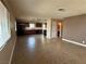 Open living room and kitchen with tile floors at 4671 Petaluma Cir, Las Vegas, NV 89120