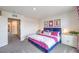 Spacious bedroom with king-size bed and en-suite bathroom at 4854 Currant Ridge Ave # 67, Las Vegas, NV 89141