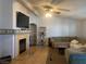 Living room featuring a fireplace and built-in shelving at 4873 Fuentes Cir, Las Vegas, NV 89121