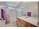 Clean bathroom with tub, shower, and vanity at 5266 Sherwood Forest Ln, Las Vegas, NV 89122