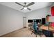 Bedroom with desk, two monitors, and ceiling fan at 5266 Sherwood Forest Ln, Las Vegas, NV 89122