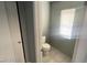 Clean bathroom with toilet and tiled floor at 5408 Indian Rose St, North Las Vegas, NV 89031