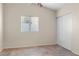 Bedroom with tile floors, window, and closet at 5409 Bible Cir, North Las Vegas, NV 89031