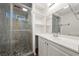 Modern bathroom with a walk-in shower and pebble floor at 61 W Wilderness Way, Pahrump, NV 89048