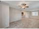 Living room with tile floors and access to kitchen area at 6144 Scarlet Leaf St, Las Vegas, NV 89148