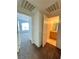 Hallway with doors to bedroom and bathroom at 6955 N Durango Dr # 2115, Las Vegas, NV 89149