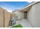 Cozy patio area with seating and lanterns, perfect for outdoor relaxation at 963 Mill Run Creek Ave, Henderson, NV 89002