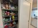 Well-stocked pantry with ample shelving for storage at 1916 Las Palmas Ln # 214, Laughlin, NV 89029