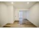 Simple bedroom with wood-look floors and a window at 1944 Allen Ave, Henderson, NV 89011