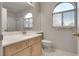 Clean bathroom with a white vanity and bathtub at 3258 Epson St, Las Vegas, NV 89129