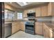 Kitchen with stainless steel appliances and granite counters at 3258 Epson St, Las Vegas, NV 89129